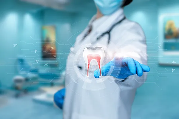 Dentist wearing a labcoat and gloves reaches out to touch a futuristic hologram of a tooth